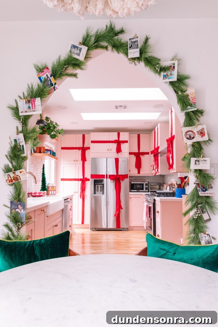 Creative Ways to Display Christmas Cards This Holiday Season 13 Christmas cards clipped to garland on archway