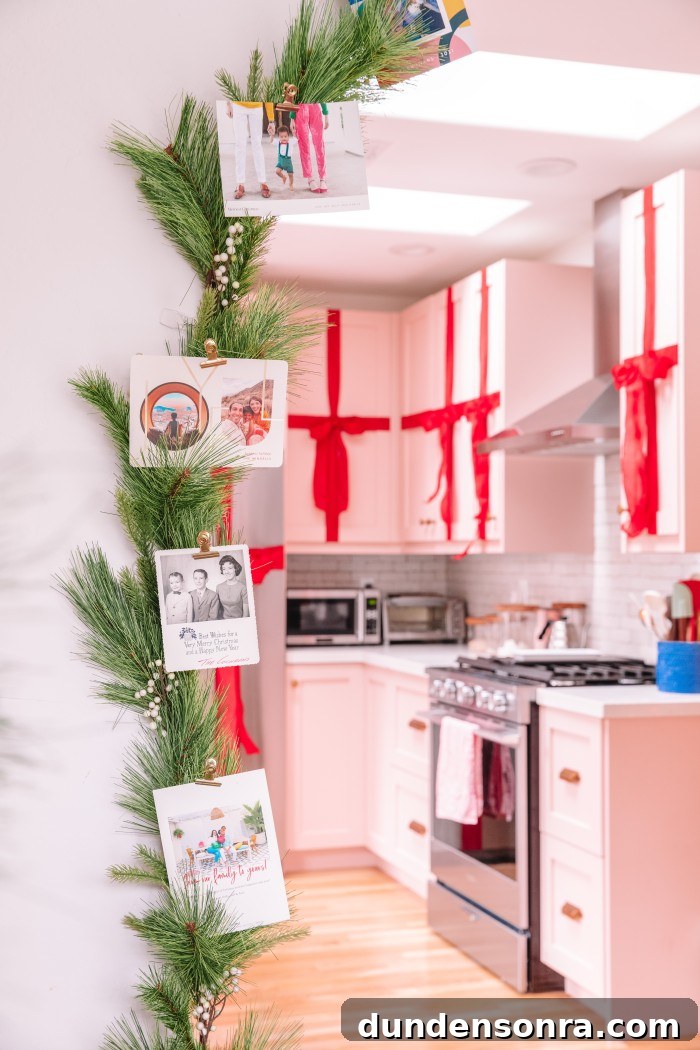 Creative Ways to Display Christmas Cards This Holiday Season 3 Garland with Christmas cards clipped to it