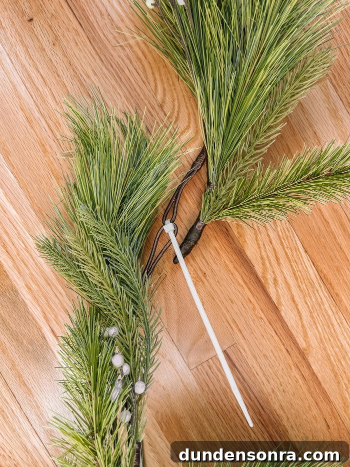 Creative Ways to Display Christmas Cards This Holiday Season 5 Garlands held together with zip tie