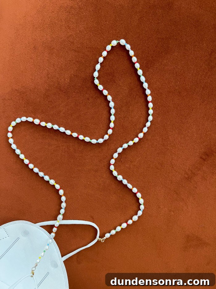 Top Purchases I Loved in 2021: Must-Have Finds and Favorites 9 pearl mask chain laying on velvet couch