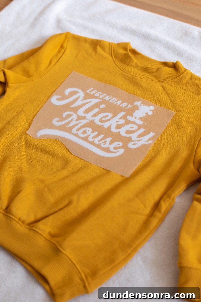 DIY Mommy and Me Disney Shirts: Matching Ideas for Moms & Kids 7 Mickey decal on yellow sweatshirt