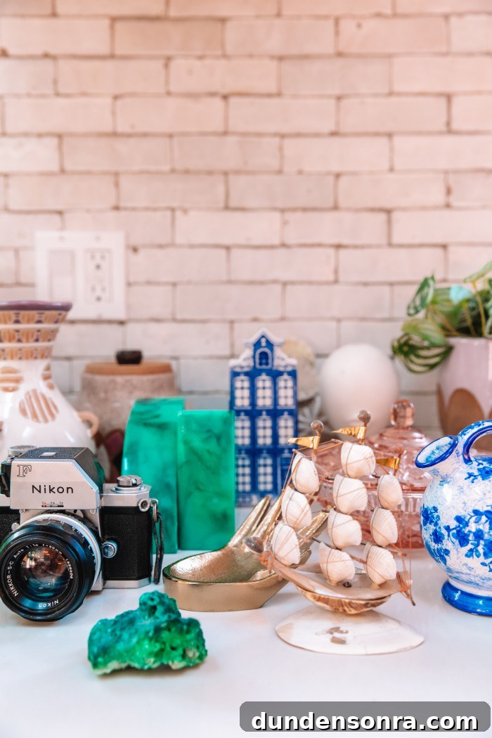 Shelf Styling Ideas: How to Arrange and Style Bookshelves Like a Pro 4 Decor and personal items gathered on counter
