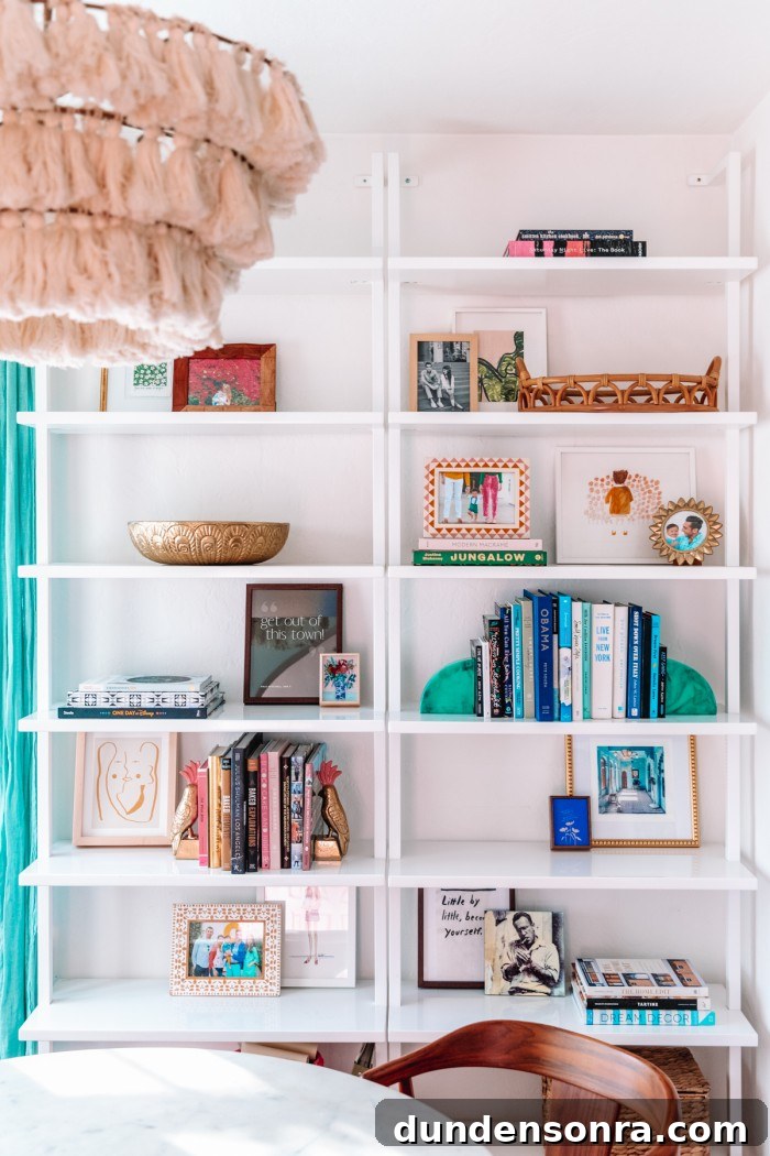 Shelf Styling Ideas: How to Arrange and Style Bookshelves Like a Pro 10 Books, art and bowls on white bookshelves