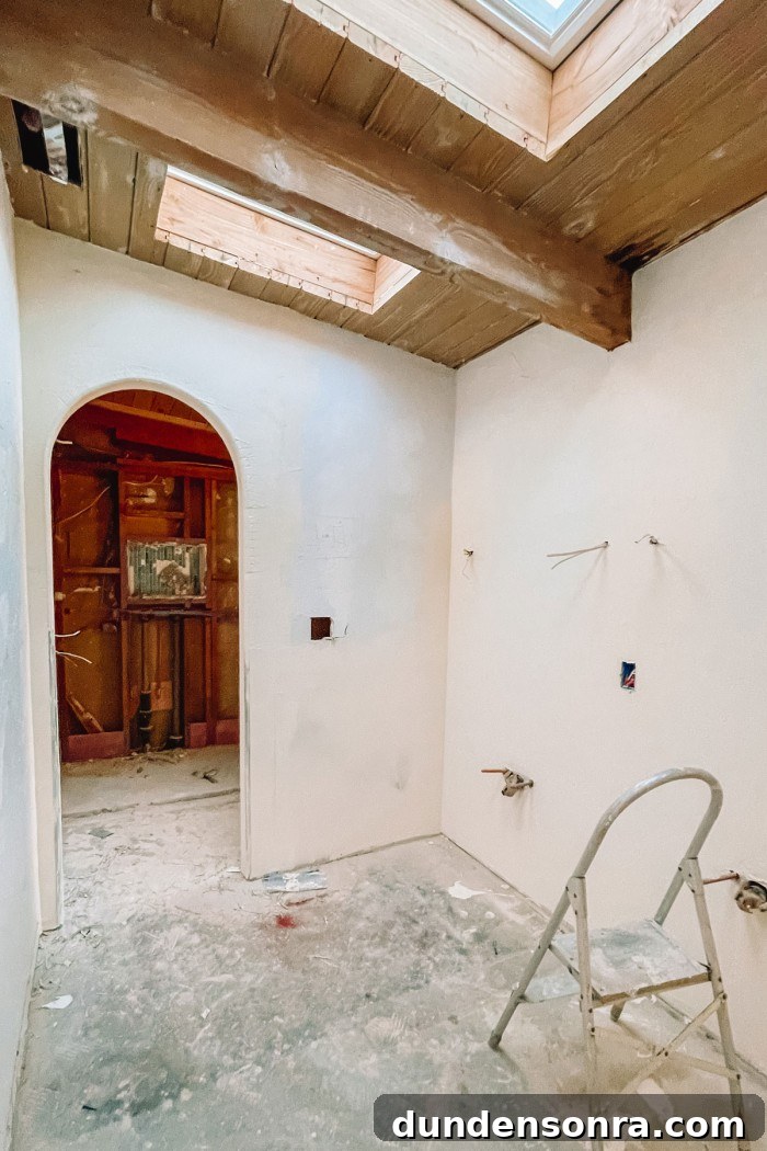 Palm Springs Main Bathroom Remodel Ideas and Plans 10 bathroom under construction with arch and wood ceilings