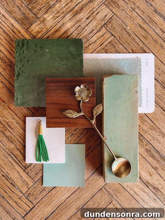 Green bathroom swatches on wood table