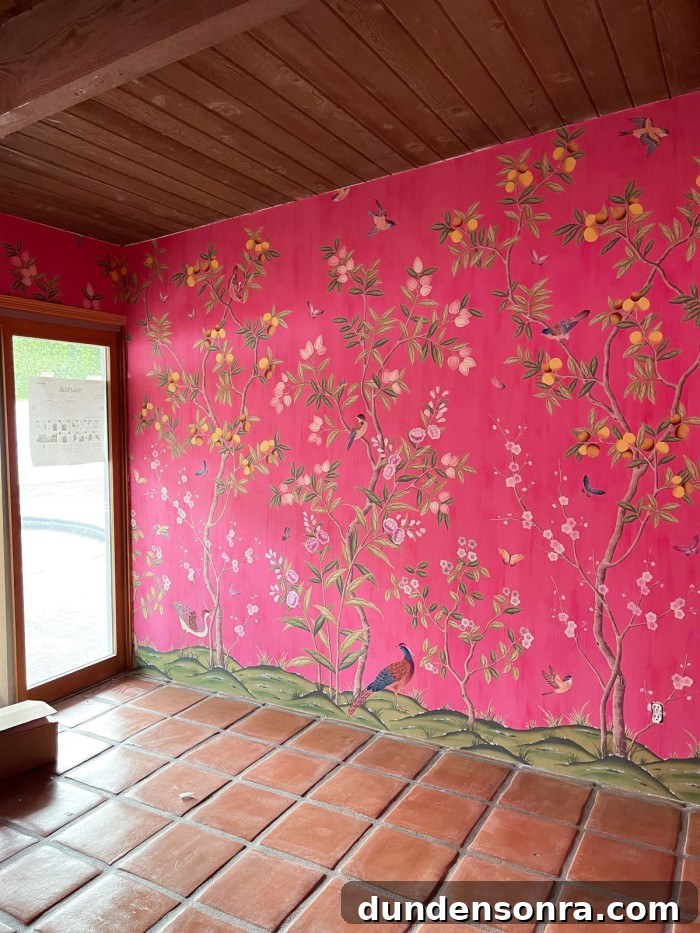 Pink chinoiserie wallpaper with wood ceilings