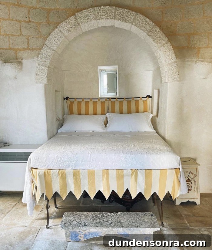 white bed with yellow stripe headboard