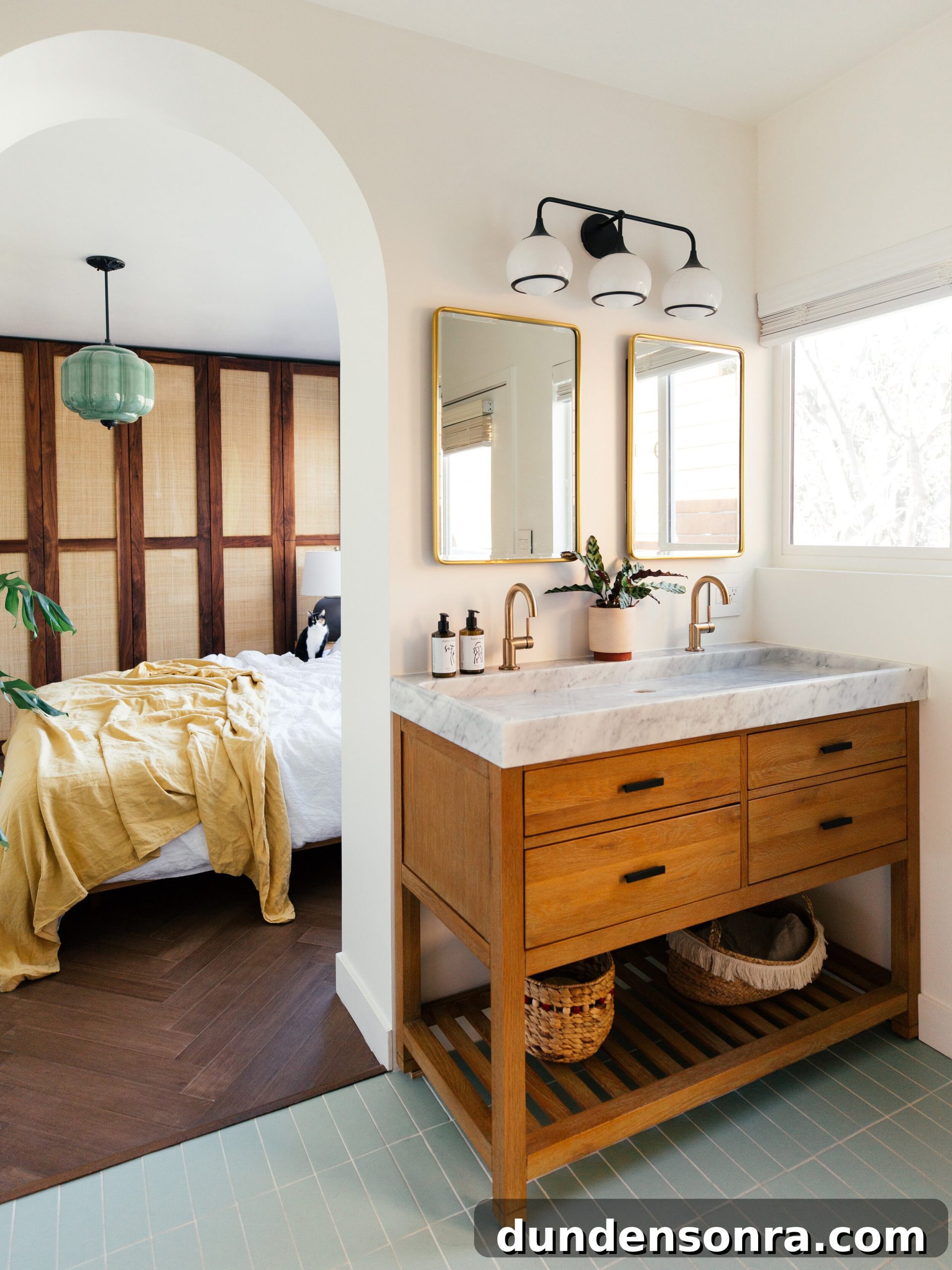 bathroom vanity with bedroom behind it