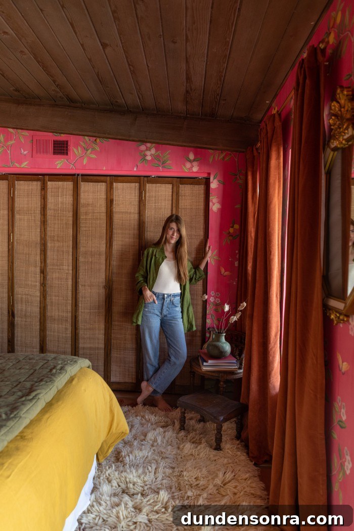 woman standing in front of rattan closet doors in bedroom