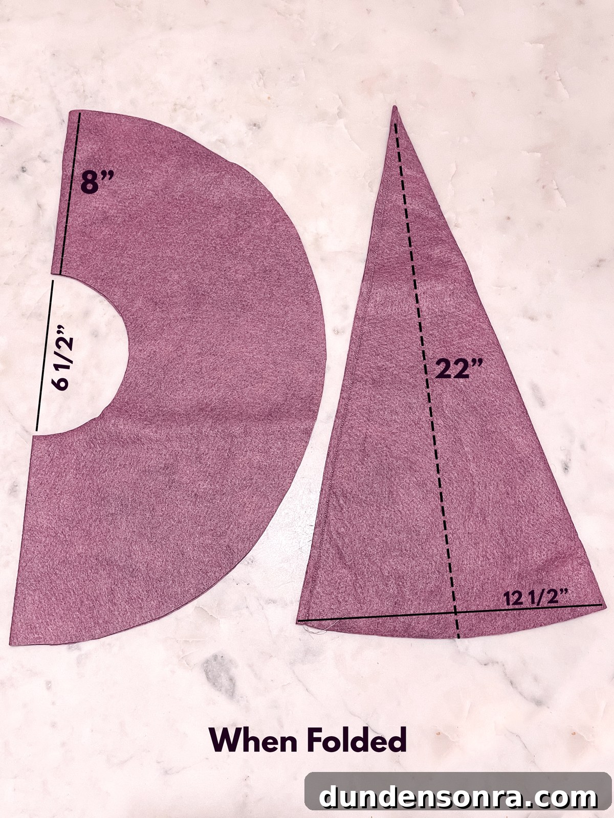 purple felt hat pieces on table