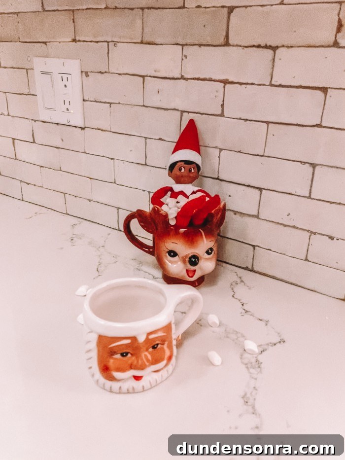 Elf on the Shelf in hot cocoa mug