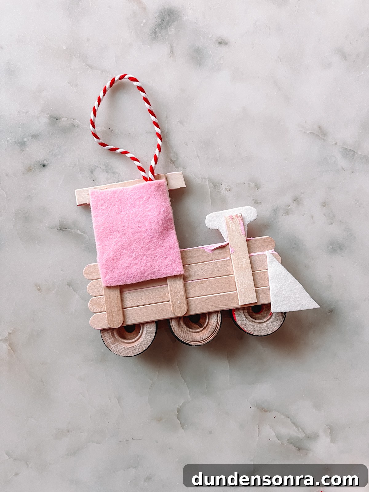 popsicle stick train marble
