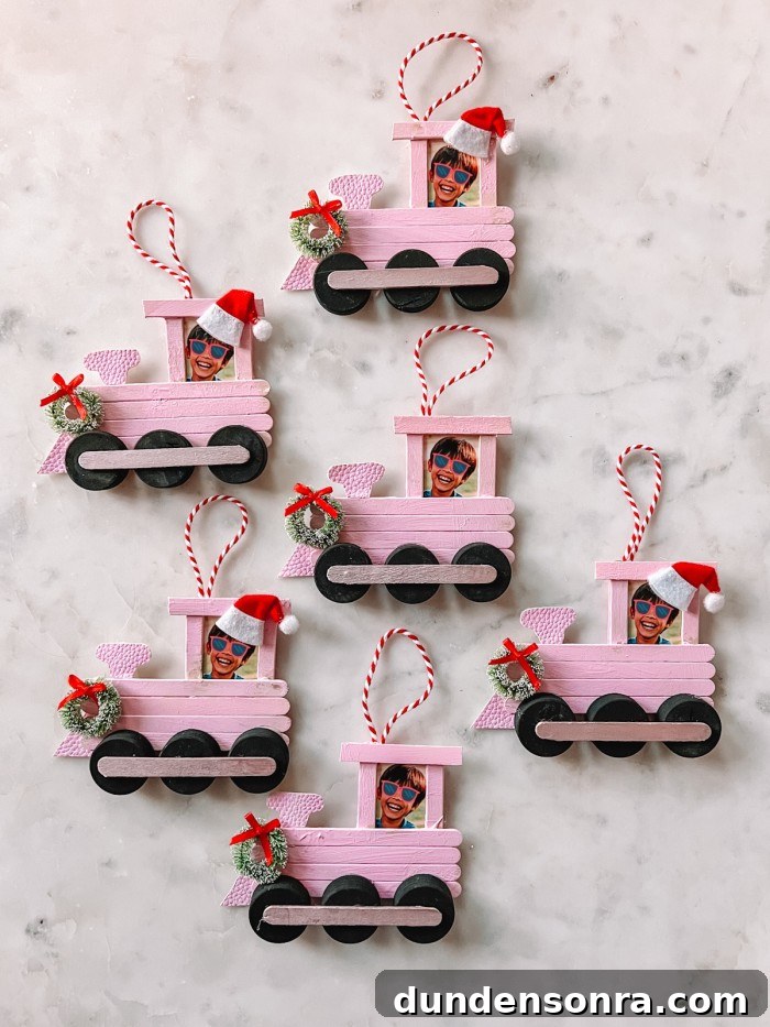 Popsicle Stick Train Christmas Ornaments on marble table
