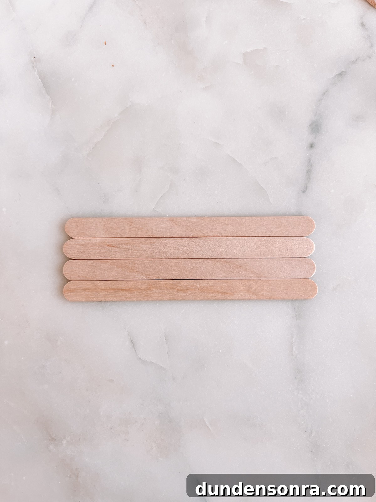popsicle sticks on marble table