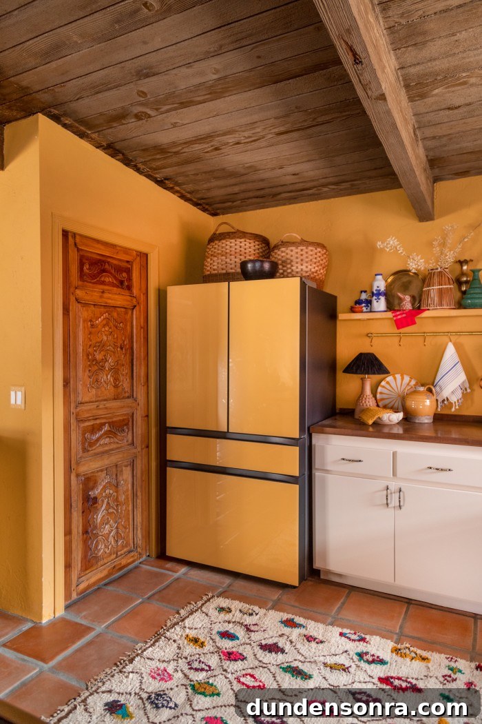 Yellow Kitchen with carved wood door