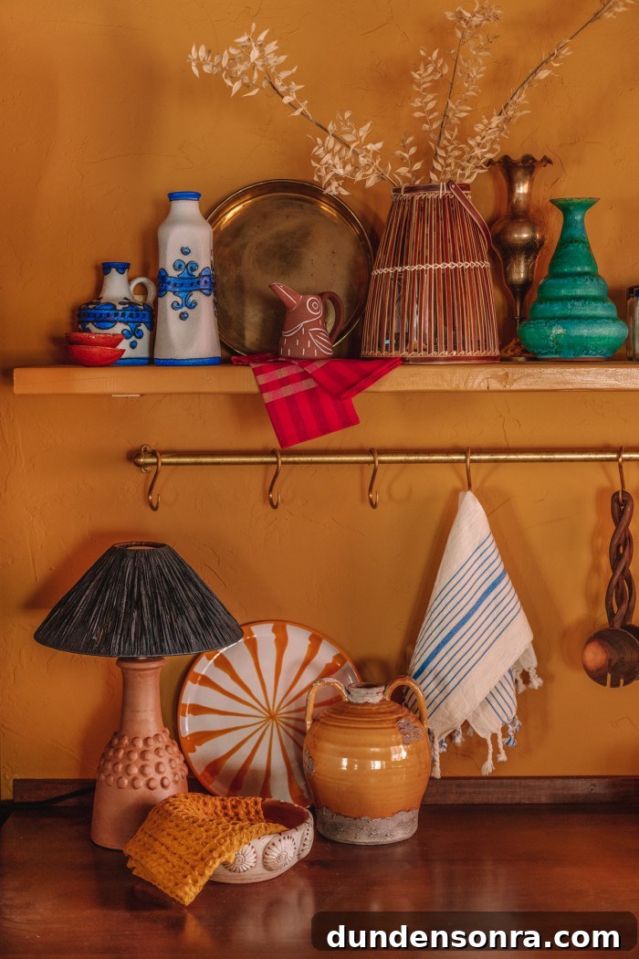 table lamp under shelf in yellow kitchen