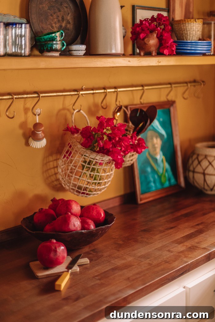 brass pot rail with basket and bougainvillea hanging