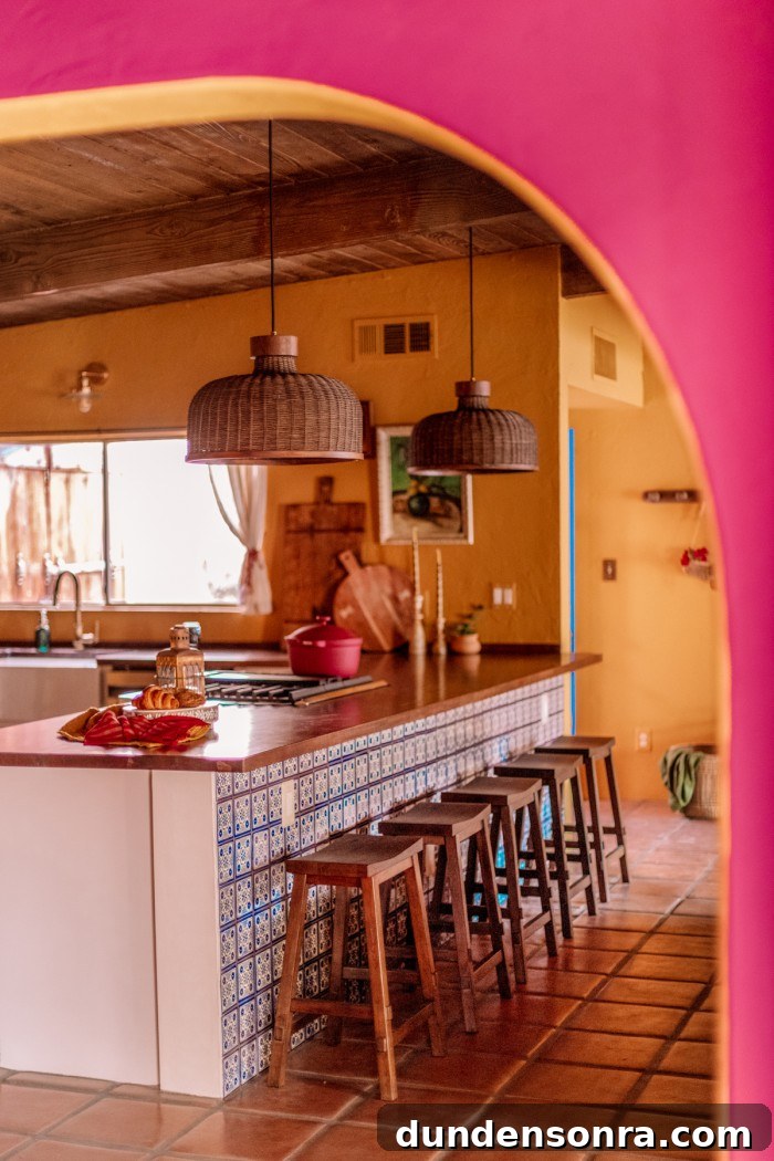 kitchen seen through pink arch