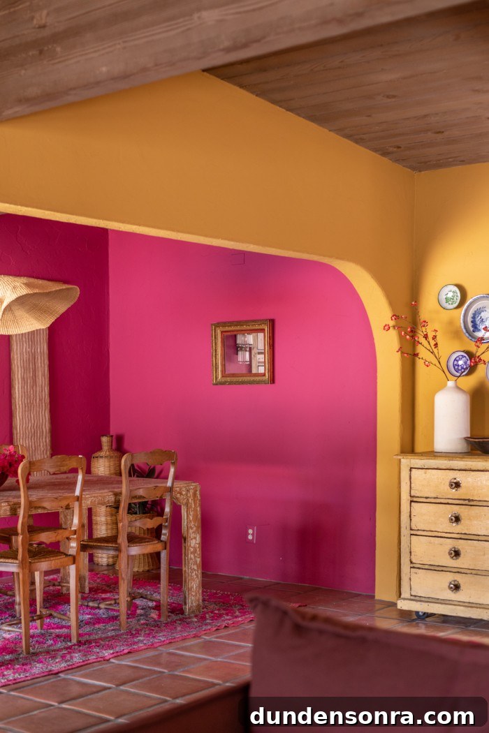 Magenta Pink Dining Room Ideas: Bold Color Decor Inspiration 15 pink dining room through yellow arch