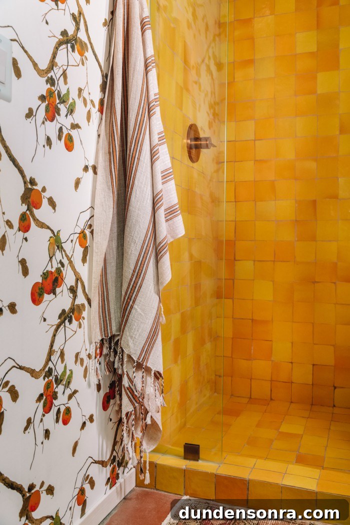 yellow shower tile with persimmon floral wallpaper