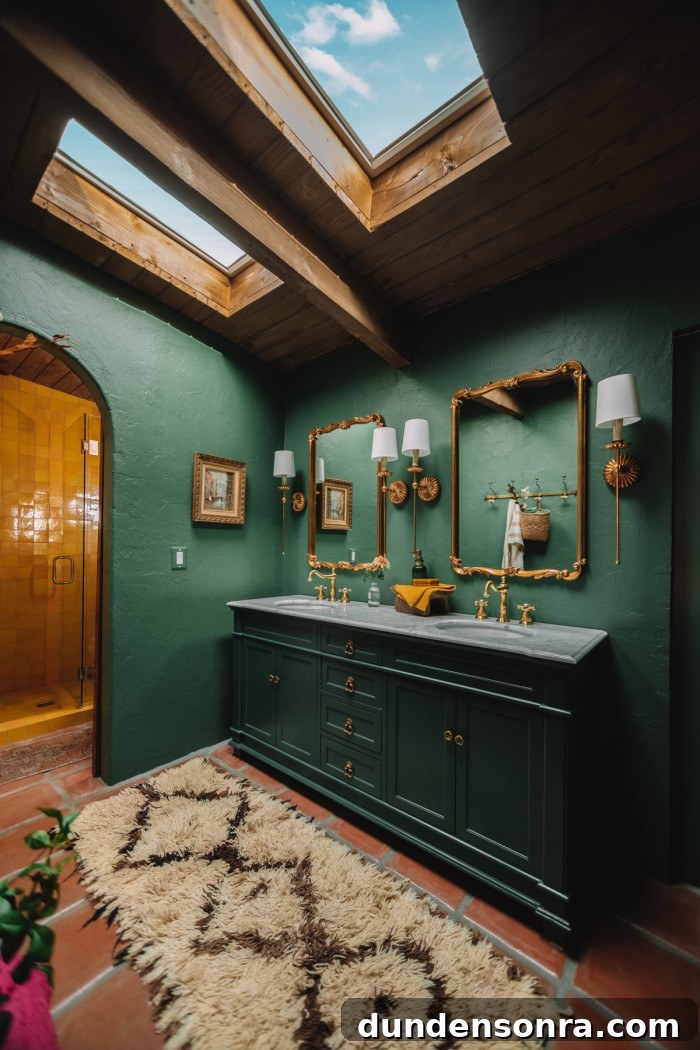 dark green bathroom with skylights