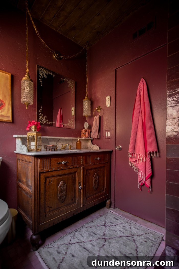 Rich, Moody Purple Bathroom Design Ideas 12 wood vanity with rug in front in purple bathroom