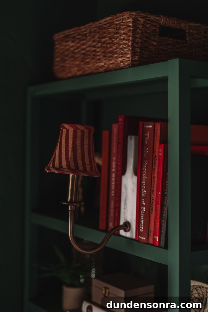 Monochromatic Dark Green Bedroom Ideas and Decor Tips 14 bookshelf light with red stripe shade