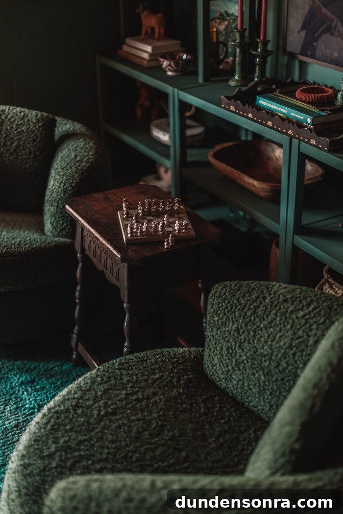 Monochromatic Dark Green Bedroom Ideas and Decor Tips 3 green chairs with wood table and marble chess set