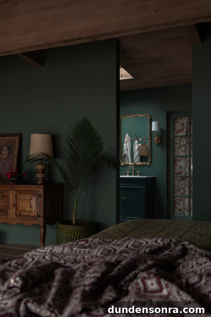 Monochromatic Dark Green Bedroom Ideas and Decor Tips 9 dark green bedroom looking into green bathroom