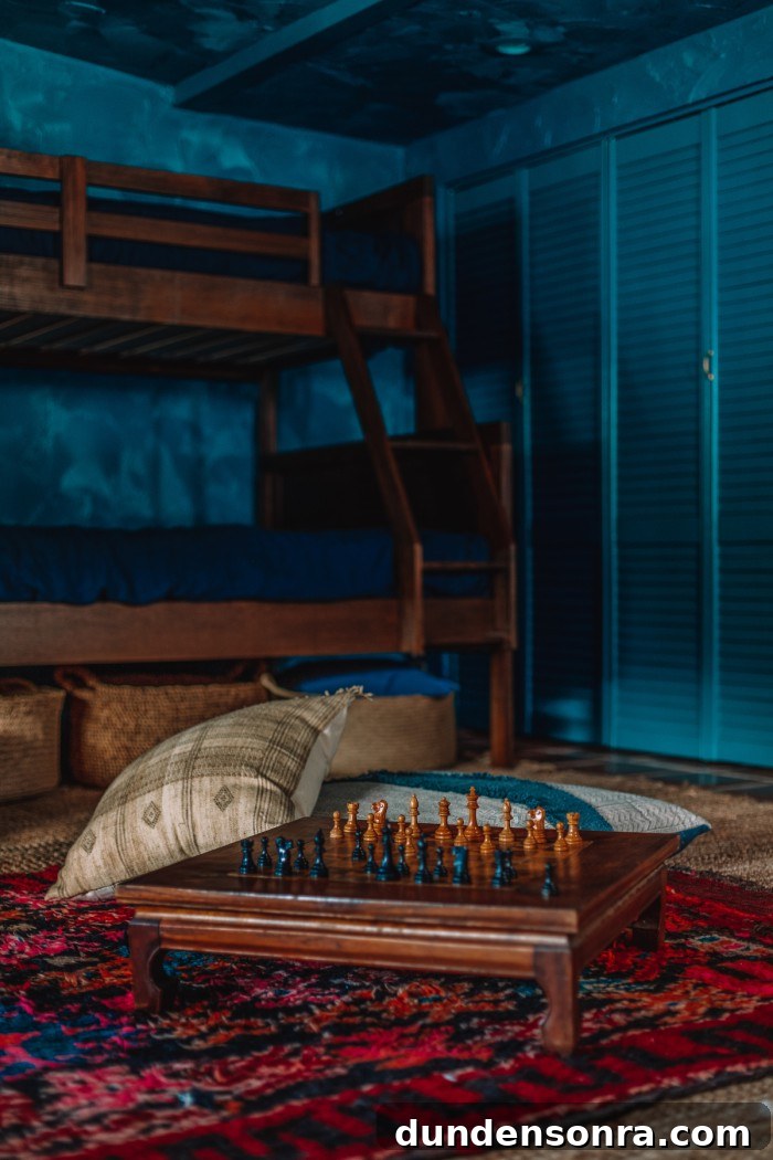 Textured Teal Bunk Room Ideas for Stylish Small Spaces 12 chess table on red rug in teal room