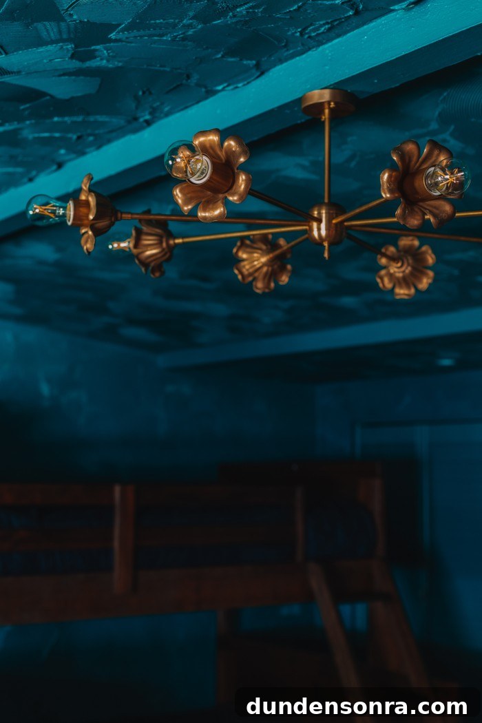 Textured Teal Bunk Room Ideas for Stylish Small Spaces 13 brass floral chandelier int teal room