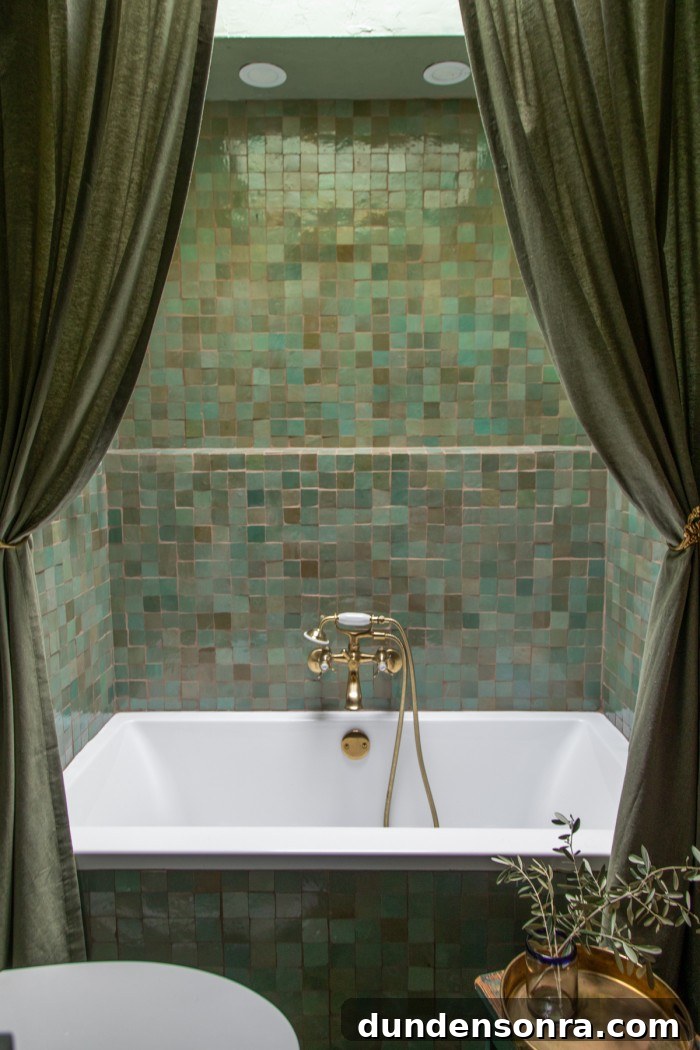 sage green bathroom with shower curtains