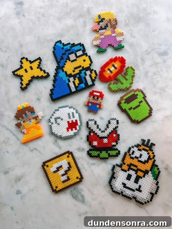 24 Super Mario Birthday Party Ideas to Wow Fans of All Ages 3 Super Mario themed peeler beads on marble table