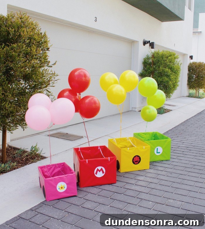 24 Super Mario Birthday Party Ideas to Wow Fans of All Ages 23 cardboard box Mario Kart cars with balloons