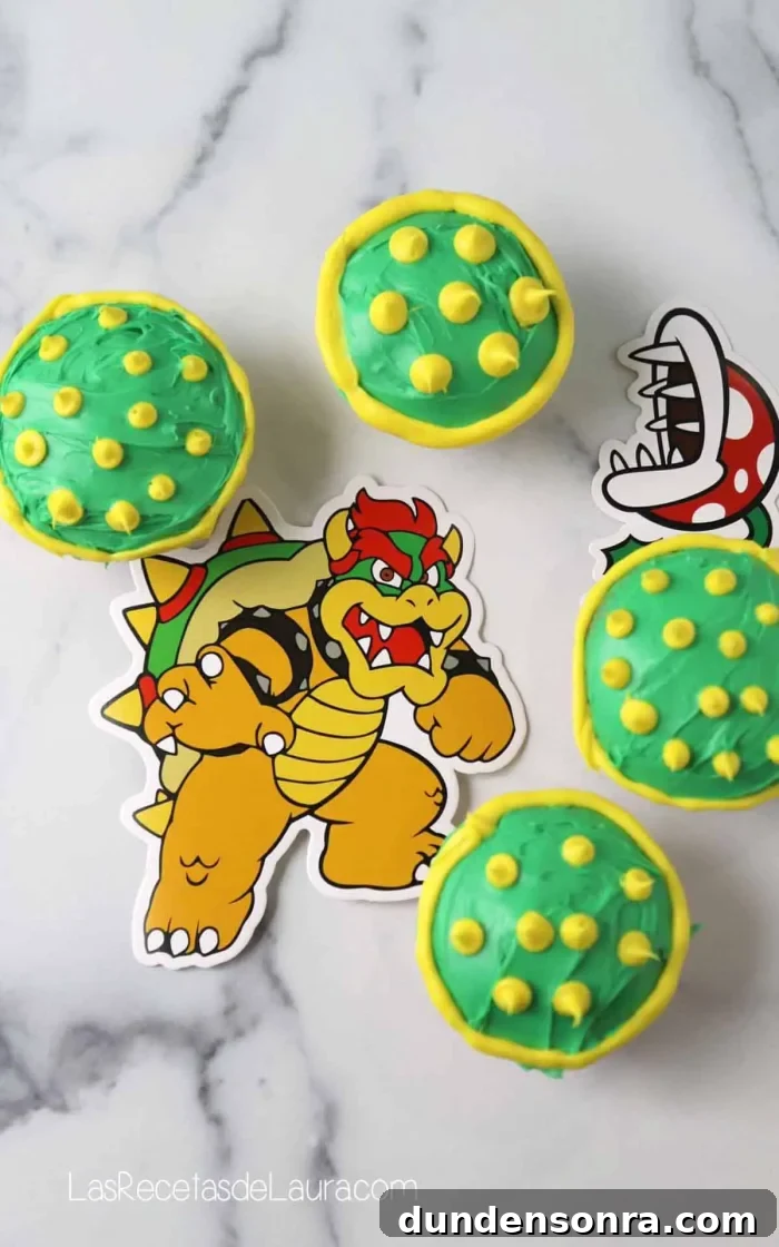 24 Super Mario Birthday Party Ideas to Wow Fans of All Ages 9 Bowser Shell Cupcakes on marble table