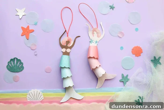 Mermaid Crafts for Kids: 25 Fun Underwater DIY Ideas 10 Mermaid decorations craft on paper.