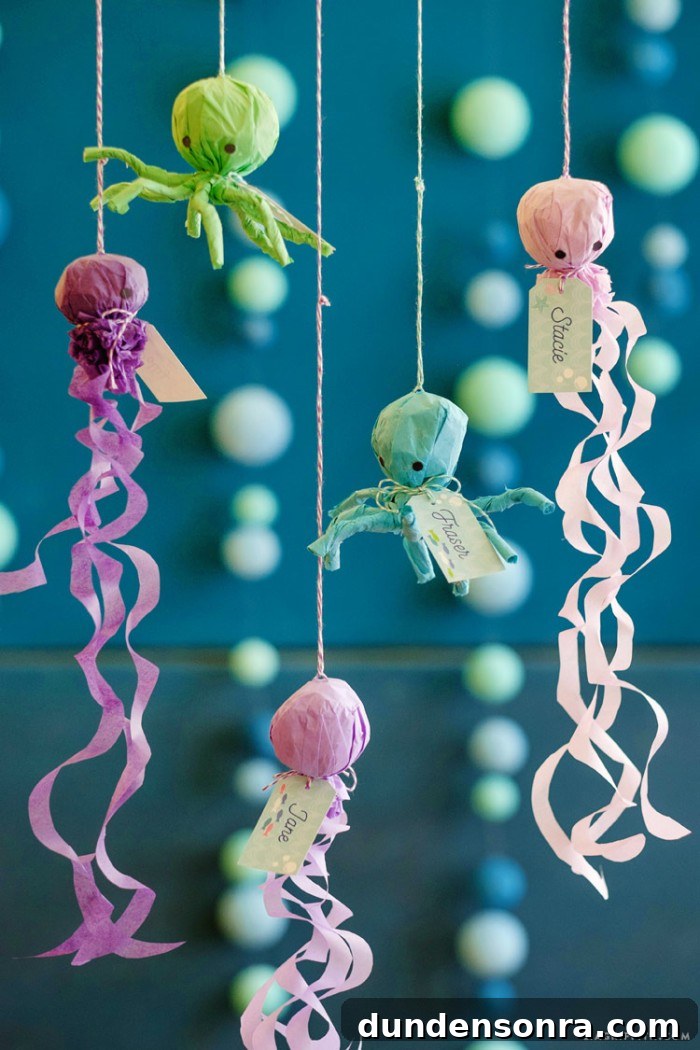 Under the sea party favors hanging by string.