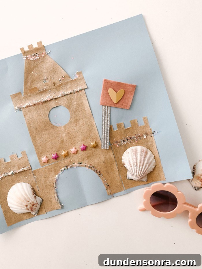 Sand paper sand castle art picture on a table.