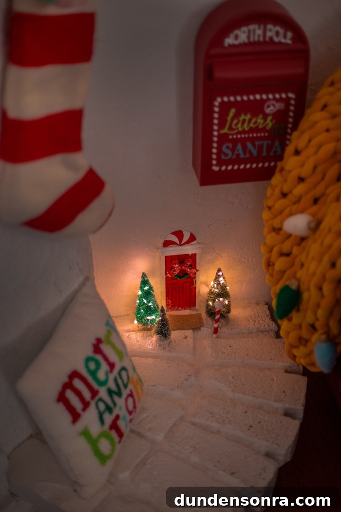 elf door on a wall with christmas decorations