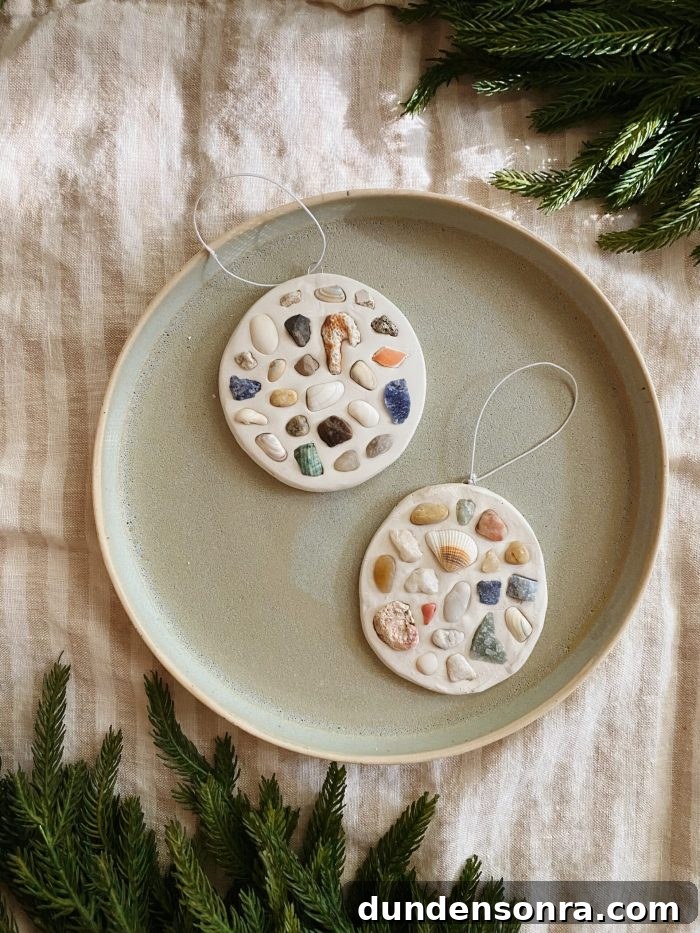 Handmade Christmas Ornaments Kids Can Make at Home 12 Shell mosaic ornaments on a plate.