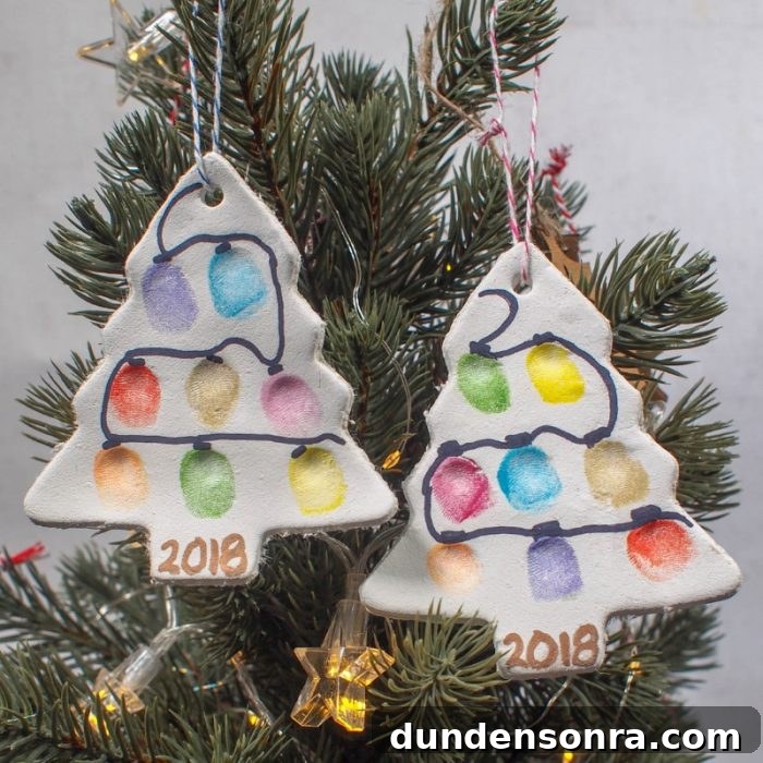 Handmade Christmas Ornaments Kids Can Make at Home 16 Two homemade Christmas tree ornaments hanging on a tree.