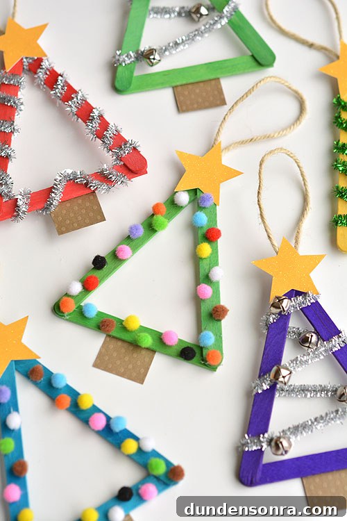 Handmade Christmas Ornaments Kids Can Make at Home 21 Popsicle stick Christmas tree ornaments.