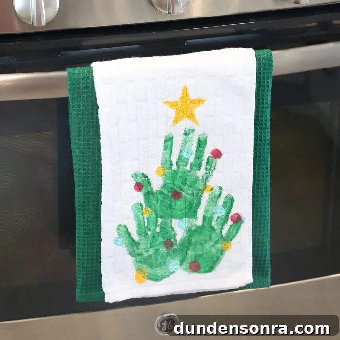 Handmade Gift Ideas Grandparents Will Cherish 12 Dish towels with hand prints to make a Christmas tree on it.
