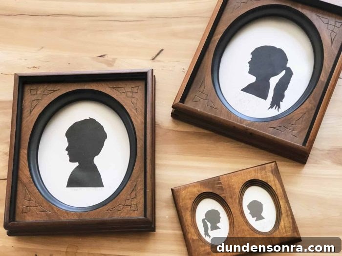 Handmade Gift Ideas Grandparents Will Cherish 14 Wooden frames with photos of black silhouettes in them.