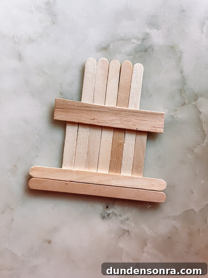popsicle sticks laid out to look like a fireplace