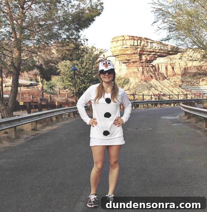 Olaf Christmas Costume Woman standing in a road, dressed as Olaf the snowman.