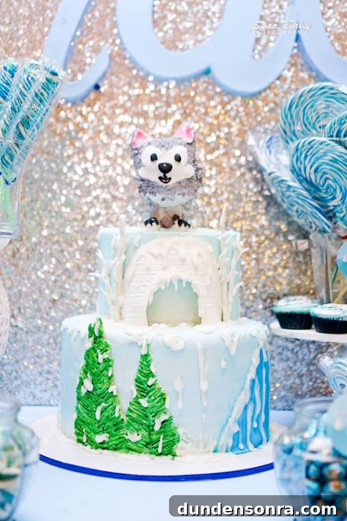 Arctic Animals Party Tiered cake with an animal shape on top.