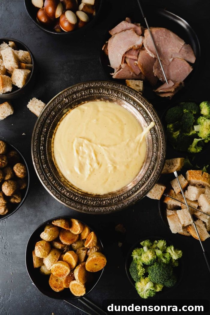 Cheese fondue surrounded by sides on a black background. 