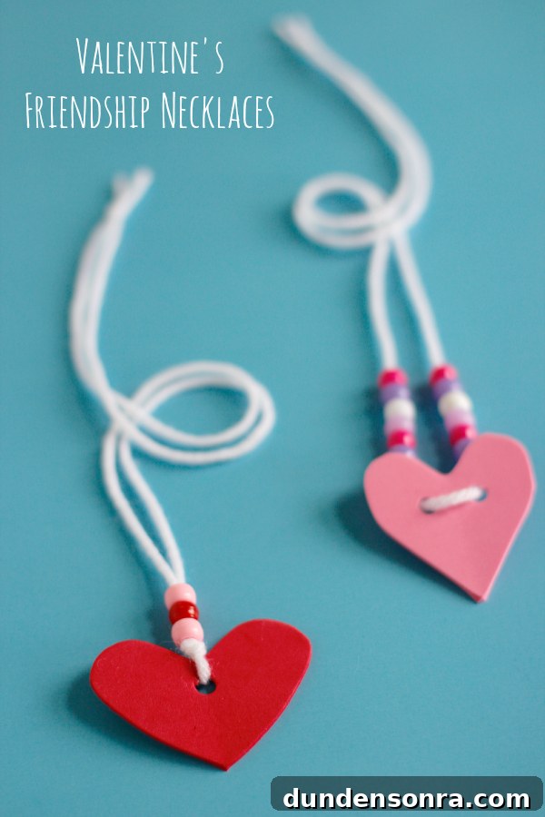 Two homemade friendship necklaces with hearts.