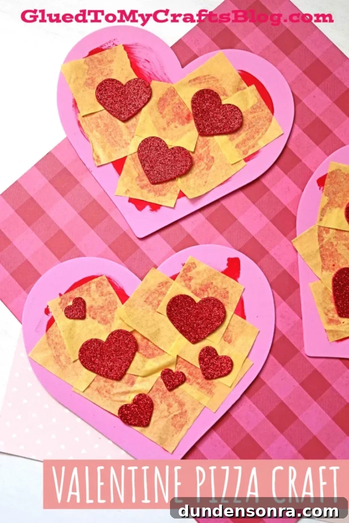 Heart shaped pizzas made out of foam paper and paint.